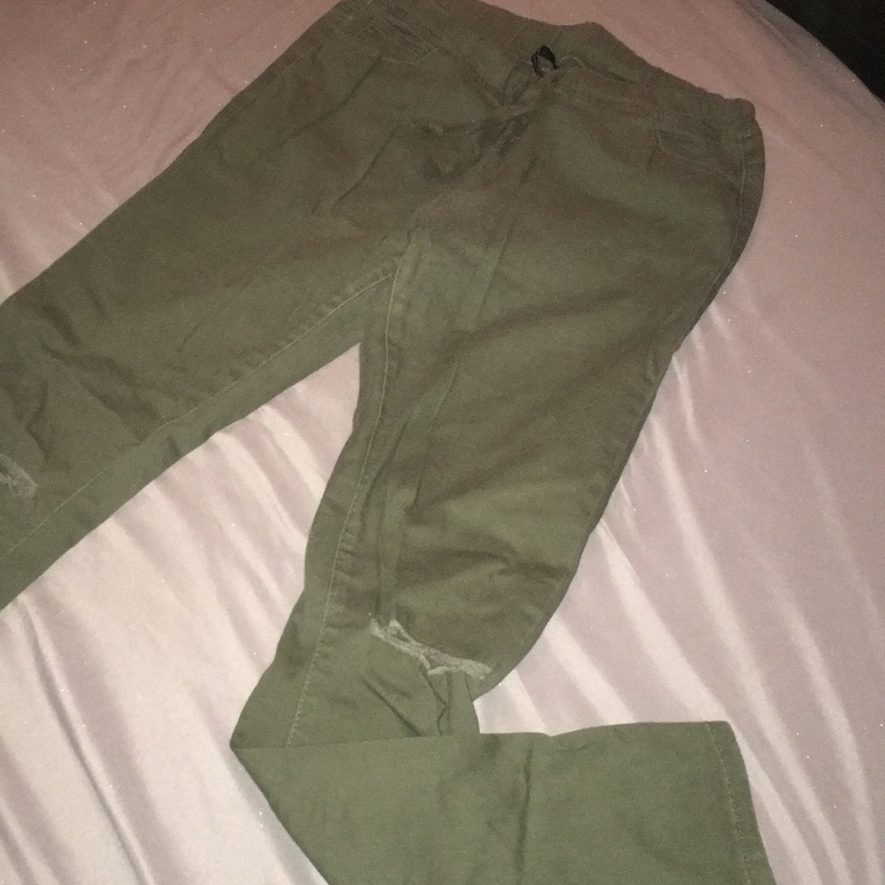 Green knee ripped jeans